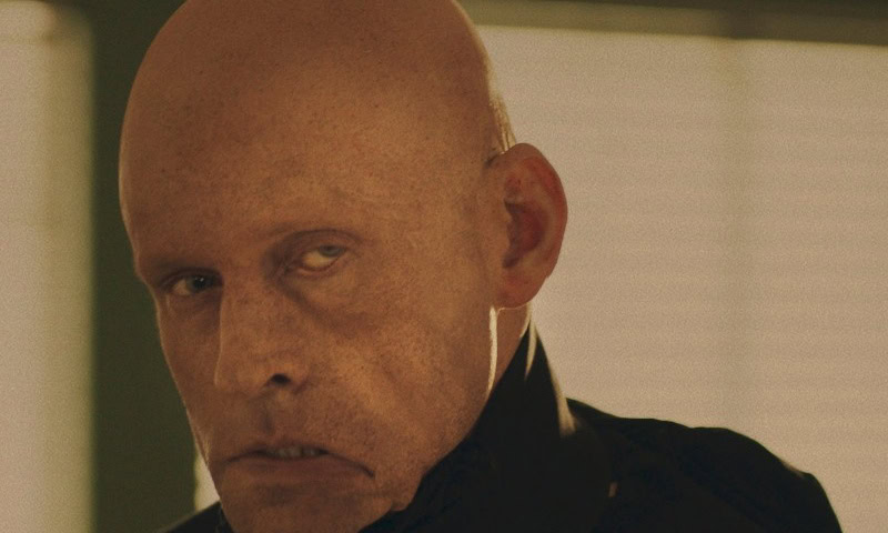 a frowning Crispin Glover in Smiley Face Killers